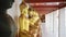 Gold Buddha Statues in Bangkok, Famous Thailand Buildings with a Line of Lots of Buddhist Statues in
