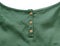 Gold buttons on Green Silk Cloth