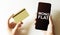 Gold card and phone with text disaster recover plan Mono Flat in the female hands