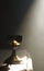 Gold chalice in altar with a ray of divine light