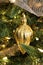 Gold Christmas tree ornament teardrop shape bright and shiney