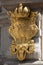 Gold coat of arms with double-headed eagle. Fragment of Marble Monument of the Holy Trinity. Second name is Plague