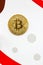 The gold coin bitcoin on a color background