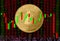 Gold coin Cryptocurrency Ethereum Round on a background of blurry numbers and a candlestick chart. Silhouettes of office workers