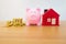 Gold coin,small house and piggybank