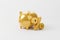 Gold color percentage icon and piggy bank on white background