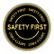 Gold color safety first round sticker on white background