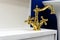 Gold colored water tap. Plumbing trade in a store. Selective focus