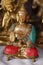 Gold colour metal hindu statue of buddha god in home