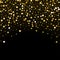 Gold confetti glitter on black background