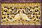 Gold couple swan craft art hand made by Asian Thai artist, install on the Thai temple wall