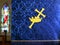 Gold cross through crown on blue banner with Jesus the good shepherd window