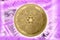 Gold Crypto Coin Cardano, on the background of the Binary code with tunnels with energies