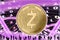 Gold Crypto Coin ZCASH, on the background of the Binary code with tunnels with energies