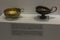 Gold cup with decoration and silver kylix with gilded handle and rim. The gold cup was part of a warrior`s grave goods. Knossos-