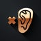 Gold Deafness icon isolated on black background. Deaf symbol. Hearing impairment. Long shadow style. Vector