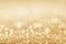 Gold defocused glitter background