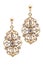 Gold earrings inlaid with precious stones on a white background