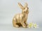 gold Easter bunny rabbit on white background