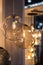 Gold fashionable oval non-standard chandelier, glass transparent pendant lamp. Crumpled glass ball