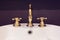 Gold faucet and washbasin design