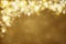 Gold festive background. Abstract golden light, radiance