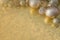 Gold Festive Christmas background. Christmas ball golden decoration.