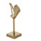 Gold figurine of a hand with a protruding thumb up on an isolated background. 3d rendering