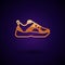 Gold Fitness sneakers shoes for training, running icon isolated on black background. Sport shoes. Vector