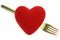 Gold fork behind red heart