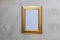 Gold frame mockup on gray wash background flat lay copy space