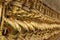 Gold garuda on the outer walls of the Temple of the Emerald Buddha,Bangkok, Thailand