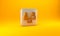 Gold Gender equality icon isolated on yellow background. Equal pay and opportunity business concept. Silver square