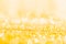 Gold glitter close-up background with shallow depth of field