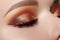 Gold glitter Eyes Make-up, bright red liner. Fashion Celebrate Makeup, Clean Skin, perfect eyebrows. Metalic eye shadows