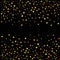 Gold glitter stars on black background.