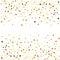 Gold glitter stars on white background.