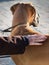 Gold Great Dane Puppy being caressed by old woman`s hand