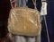 Gold handbag on market