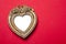 Gold Heart Picture Frame On Red