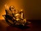 Gold Hotei seating in the rocking-chair