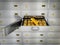 Gold ingots inside private bank deposit box. 3D illustration