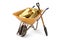 Gold ingots on wheelbarrow and shovel on white background 3D ill