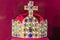 Gold and jewell-studded King`s crown close-up in the gallery
