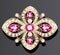 gold jewelry brooch with rubies and pearls