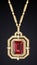 gold jewelry pendant with ruby and precious stones