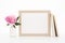 Gold landscape frame mockup with flowers and books