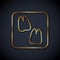 Gold line Camel paw footprint icon isolated on black background. Vector