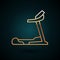 Gold line Treadmill machine icon isolated on dark blue background. Vector