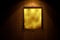 Gold magic mirror on grunge wall